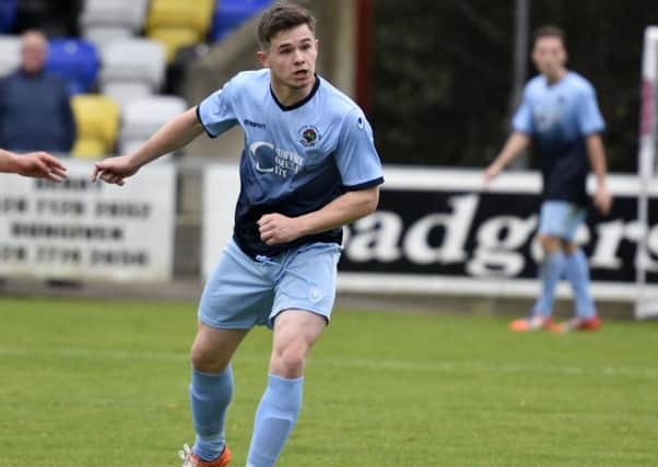 Institute's Michael McCrudden had their only chance in the second half during their loss to Warrenpoint Town.