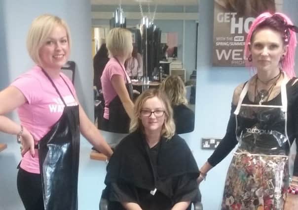 Hairdressing lecturer Sophie Carlisle- Norton volunteered to dye her hair pink for Cancer Focus NIs In Pink campaign. INNT 44-837CON
