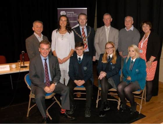 Mark Carruthers pictured with Drew McCrelles and Lavinia Eakin, Ballymoney High School, and Ciara McMorris, North Coast Integrated College, and Councillors William McCandless, Stephanie Quigley, Deputy Mayor James McCorkell, Ian Stevenson, Dermot Nicholl and Joy Wisener, Good Relations Officer.