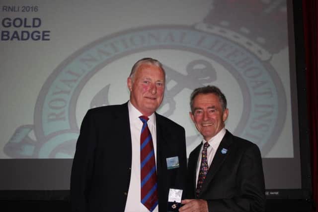 Rodney Byrne receives his award from Charles Hunter-Pease.