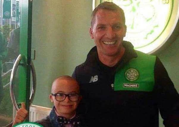 Jay Beatty with Celtic manager Brendan Rodgers