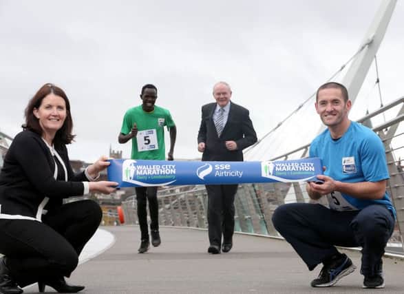 ON YOUR MARKS -  At the launch of the 2017 SSE Airtricity Walled City Marathon Eimear Lenehan, SSE Airtricity, Kenyan runner Freddy Sittuk , Deputy First Minister Martin McGuinness MLA and Tommy McCallion, local runner. (Photo: Matt Mackey  - Press Eye)