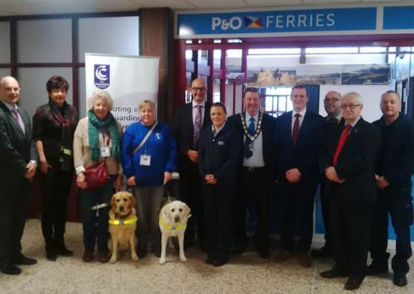 Larne Port and Consumer Council representatives highlight improvements being made to special assistance services for those passengers travelling with a disability or reduced mobility. Attendees included Roy Beggs MLA,  Gordon Lyons MLA, Oliver McMullan MLA, Deputy Mayor Alderman William McNeilly, Mid and East Antrim Borough Council and representatives from Guide Dogs NI. INLT-43-704-con