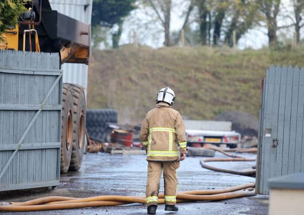 Firefighters at the scene on the Drumnacanvy Road outside Portadown where they tackled a major fire at an industrial unit.



Picture by Jonathan Porter/Press Eye