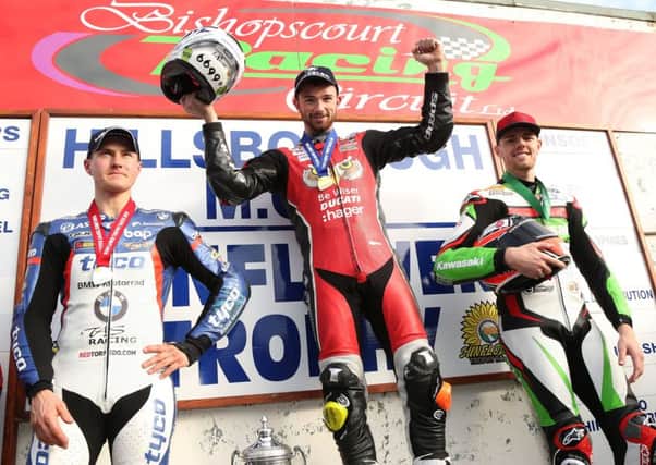 Glenn Irwin (Be Wiser/PBM Ducati) celebrates his victory in the feature race at the Sunflower Trophy meeting at Bishopscourt with runner up Christian Iddon (Tyco BMW) and Danny Buchan (MSS Kawasaki).