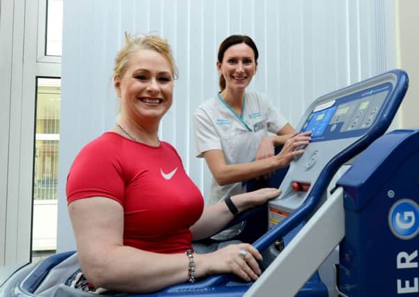 Wendy Guy, Advanced Clinical Specialist Physiotherapist with Charlene Lyness, who is benefitting from the anti-gravity treadmills in the Southern Health and Social Care Trust.