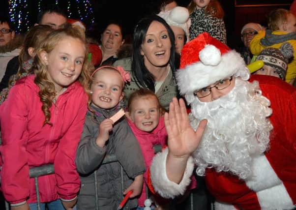 Smiling For Santa... At the switching on of the Christmas tree lights at Legahory last Wednesday. INLM49-212.