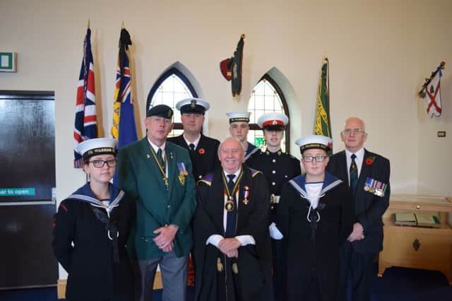 Pastor Sam Grant with representatives of the Ulster Defence Regiment CGC Association, Royal British Legion and Sea Cadets TS Warrior at Christchurch, Carrickfergus. INCT 45-799-CON