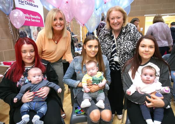 Shona Johnston (Family Nurse Partnership Supervisor) and Marian Robertson (Former Assistant Director Children's Health) with mums and babies who are enrolled on the programme.