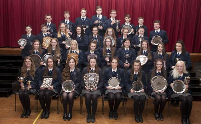 WINNERS ALL. Pictured are pupils with their awards on Friday.INBM38-16 011SC.