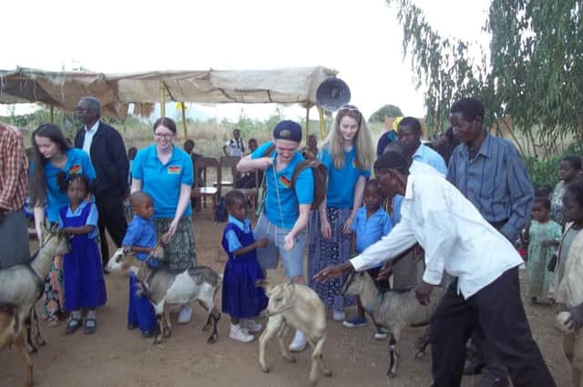 ZAP members pictured recently handing over of goats.