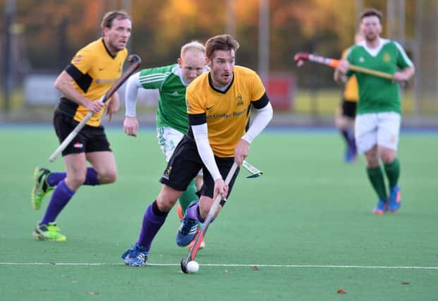 Instonians Chris Kirk on the attack during thier EY Irish Hickey League draw with Glenanne at: Shaw's Bridge
 on Saturday. (Photo Credit: Rowland White PressEye)