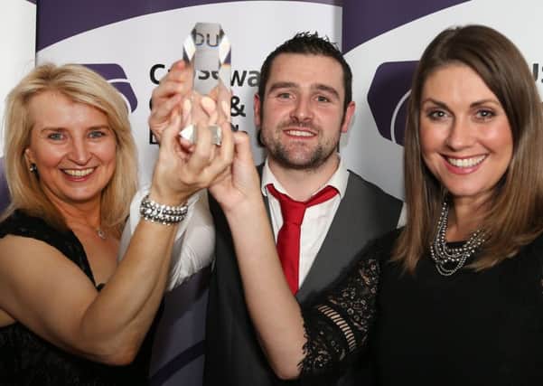 Ballymoney road racing star Michael Dunlop was named Sportsman of the Year at Causeway Coast and Glens Borough Council Sports Awards. He's pictured with Wendy McCullough, council's head of Sport and Wellbeing  and compere for the evening, TV personality Sarah Travers .PICTURE KEVIN MCAULEY/MCAULEY MULTIMEDIA.