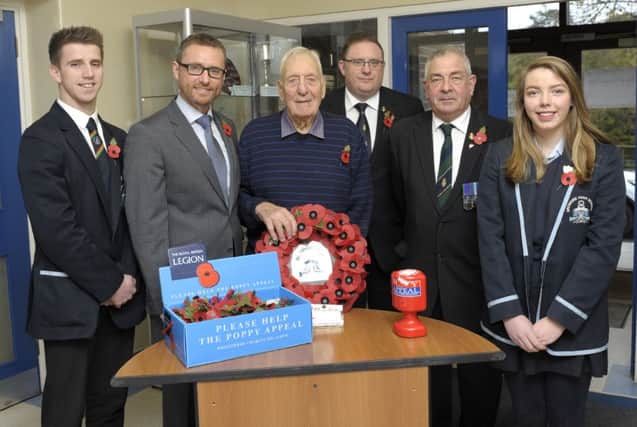 Pictured at the Rememembrance Assembly in Dromore High School are from left Head Boy Ben Martin, Headmaster Ian McConaghy, Special Guest WWII Veteran Bob Lingwood, Dromore RBL Secretary / Treasurer Colin Cunningham, Dromore RBL Poppy Appeal Organiser Samuel Newell and Head Girl Holly O'Connor Â©Edward Byrne Photography INBL1646-201EB