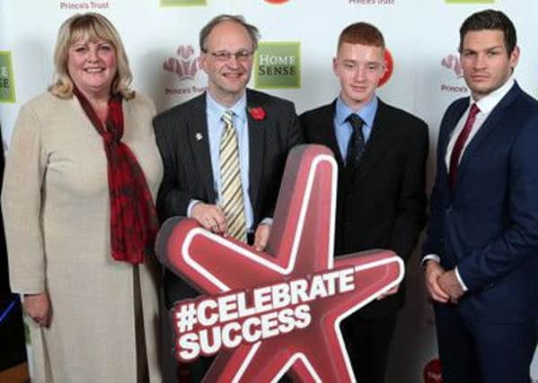 Paul Laverty (Centre-Right) pictured with Diane Poole OBE of Stenaline, Education Minister Peter Weir and Adam Keefe of Belfast Giants at The Prince's Trust and TK Maxx & HomeSense Celebrate Success Awards.