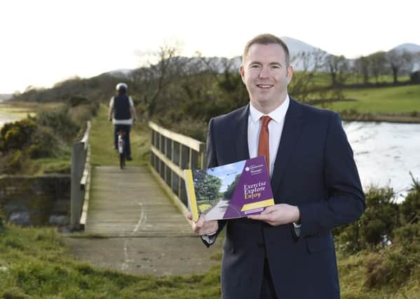 REPRO FREE

9/11/16: Infrastructure Minister Chris Hazzard at the old railway track near Dundrum, as he launches his plan to develop 1000kms of greenways paths across the north. Picture: Michael Cooper