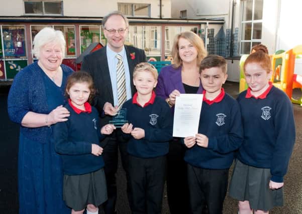 Education Minister, Peter Weir, has presented Harryville Primary School with the prestigious Marjorie Boxall Quality Mark Award for Nurture provision.