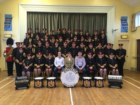 Dunloy Accordion Band members with First Minister Arlene Foster and MLAs Mervyn Storey and Paul Givan. INBM 47-701-CON