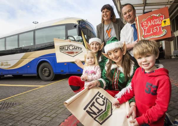 Nyla and Colby Kaminski are pictured alongside Sean Brown, Ulsterbus Inspector, Roseanne Sturgeon, Young at Art and Santas little elves.  To coincide with this years Christmas lights switch-on, Translink and Young at Art will be hosting a special Santa letter writing workshop in Foyle Street Bus Station on 17th November
