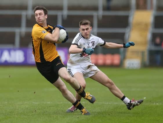 Pomeroy's Ciaran McKenna takes on Castledawson's Conor Taggert
 in the Ulster Intermediate semi-final at the Athletic Grounds,  Armagh.
 (Photo: Matt Mackey / Press Eye)