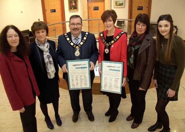 The Mayor of Antrim and Newtownabbey, Councillor John Scott and The Deputy Mayor, Councillor Noreen McClelland are pictured with Lorna Dougherty (Volunteer Co-ordinator), Brenda McConville (Management Committee), Cathy Gillespie (Accommodation Services) and Sara McGaw (Accommodation Services Placement Student) from Women's Aid.  The Council has signed the White Ribbon campaign which is a personal pledge to never commit, condone or remain silent about violence against women.  The pledges will be displayed in Antrim Civic Centre and Mossley Mill.