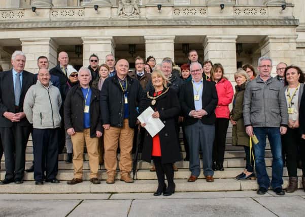 Deputy Chair of Mid Ulster District Council, Cllr. Sharon McAleer, joined by representatives of the local community and voluntary sector, NIPSA and those affected to deliver Letter of Concern to Minister at Stormont.