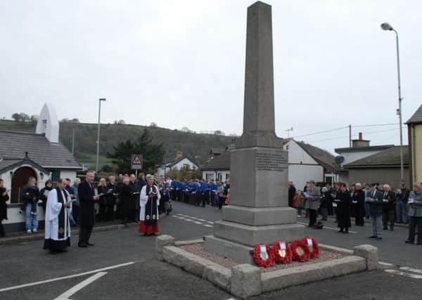 The Remembrance Sunday service at the Glynn Cenotaph. INLT 46-376-PR