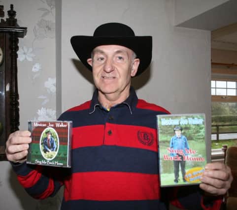 Mexican Joe Walker with his latest recordings - a DVD and CD entitled Sing Me Back Home.