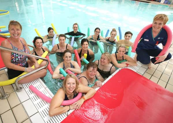 Local parents and midwives from the Lagan Valley and Ulster Hospital midwifery-led units enjoying Aqua Natal Yoga.