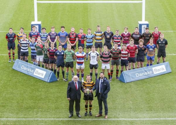 At the draw for the Danske Bank Ulster Schools Cup are John McKibbin, Ulster Branch President, Michael Lowry captain of the holders RBAI and Ian Russell District Manager at Danske Bank, together with the captains from the seasons comping schools at Kingspan Stadium