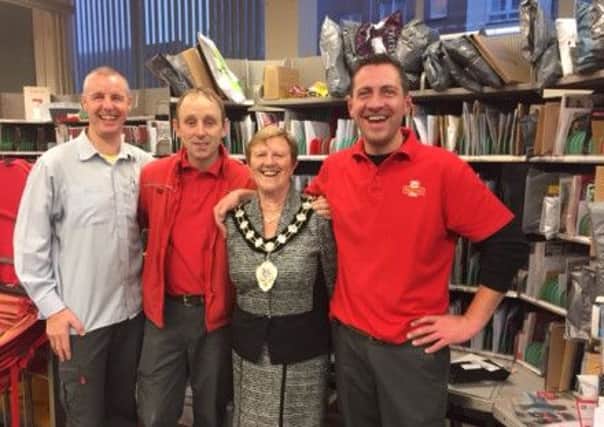 Postmen Terry OToole, Ellis Martin and Martin OBoyle with Mayor Wales.