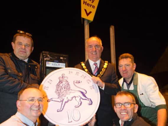 Chair of Mid Ulster District Council, Councillor Trevor Wilson launches 10p parking scheme in Magherafelt and Dungannon from 26 November to 7 January (for the first 3 hours) with Dungannon traders Stephen McMullan, Brendan Lowe, Linton McKeown and Malachi Mallon