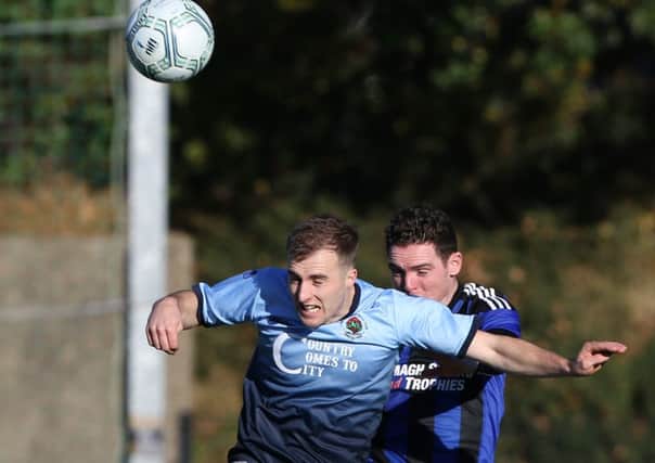 Institute winger Stephen Curry scored a brace of goals in the club's 2-1 win at Loughgall.