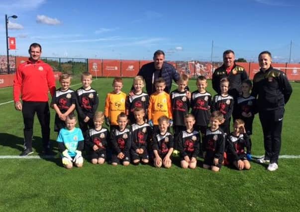 Portadown Youth under eights at Liverpool's Kirkby Academy. Also included with the tourists is Liverpool legend Jamie Carragher.