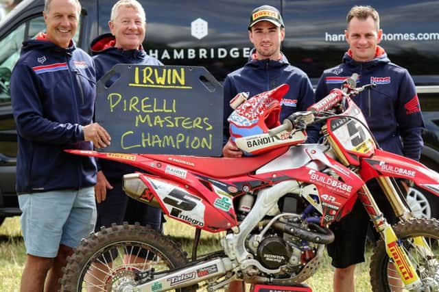 Graeme Irwin with his Buildbase Honda team.