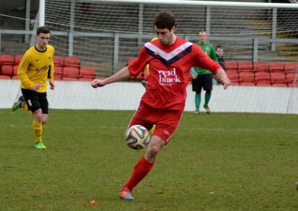 Ballyclare Comrades Chris Trussell on the ball. INNT 11-062-GR