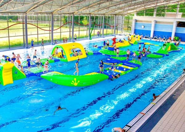 An impression of the pool with inflatables at the new Â£30m leisure centre planned for Craigavon