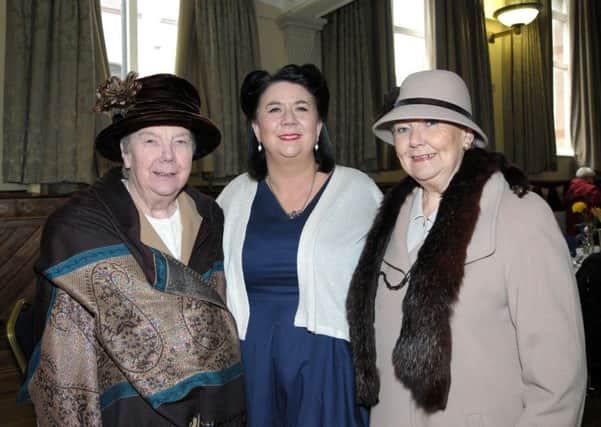 Patricia McCready, Volunteer Susan Gillander and Norma Lappin looking the part at the Good Morning Larne 10th Birthday Party. INLT 47-200-AM