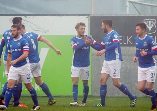 Celebration time for Linfield at Shamrock Park in the 5-0 victory over Portadown. Pic by PressEye Ltd.