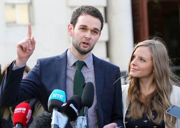 Daniel McArthur (director of Ashers Bakery) with wife Amy, speaking outside court after losing their appeal against a ruling that their refusal to make a "gay cake" was discriminatory.
