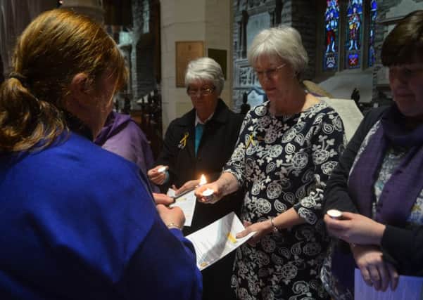 The President of Derry and Raphoe Mothers' Union, Mary Good (second from right) at the vigil against gender violence