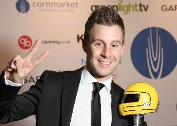 Jonathan Rea celebrates with the Joey Dunlop Trophy after being crowned Irish Motorcyclist of the Year. Pic by Stephen Davison/Pacemaker.