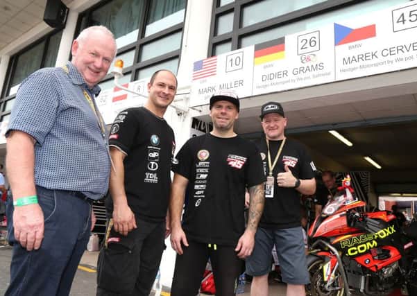 North West 200 Event Director Mervyn Whyte pictured with Didier Grams, Marek Cerveny and Team Heidger-Motorsport boss, Frankie Heidger, at the Macau Grand Prix.