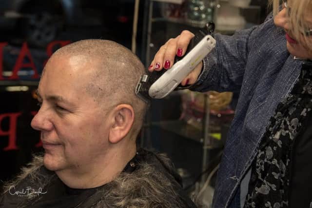 Trevor Harvey has his head shaved for Hope House Ireland. Pic by Cyril Boyd. INNT 49-455-CON