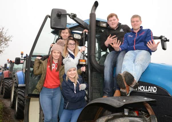Jonathan Knight, Matthew Burley, Jemma Downes, Chloe Hall, Rebekah Haffey and Leah Johnston, wait for the start of the inaugral Mountnorris Young Farmers Club Tractor Run, in aid of B.R.A.K.E. Charity and Mountnorris Young Farmers Club.  Â© Photo: Gary Gardiner.