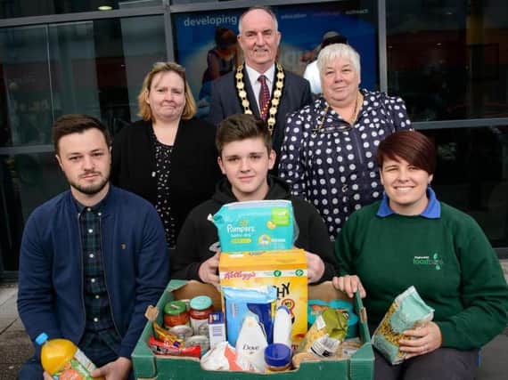Chair of Mid Ulster District Council, Trevor Wilson has pledged his support for the food bank appeal. He is pictured with, from back left, Heather Boyd (The Link, Maghera) and Anne Coney (SVP) and front, from left, Matt Graham (Vineyard Church), Luke Boyd (The Link, Maghera) and Jenny Thompson (Magherafelt Food Bank)
