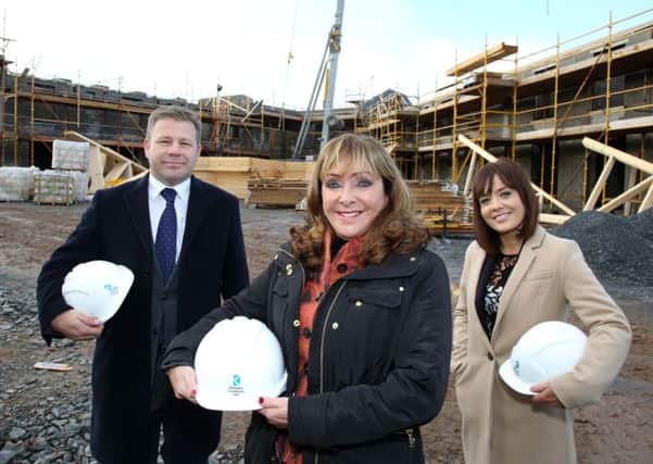 Chairperson of Maryland Healthcare, Audrey Lockhead (centre) on site at the new Maryland Healthcare facility with Kenton Hilman and Lisa Allen of Ulster Bank. Pic by Darren Kidd / Press Eye