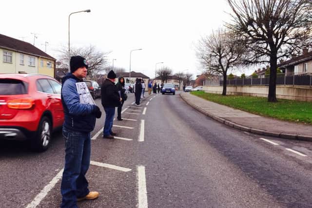 Scores in white line vigil for Dungannon men in 'solitary confinement'