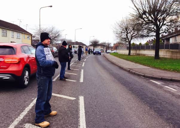 Scores in white line vigil for Dungannon men in 'solitary confinement'