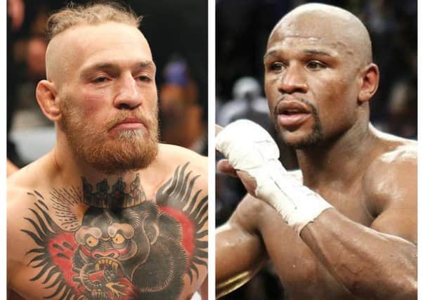 Conor McGregor (left) and Floyd Mayweather Jnr.
